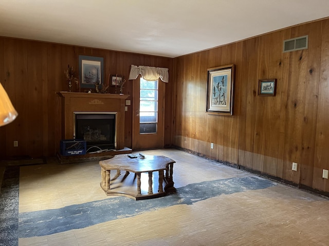 living room featuring wooden walls