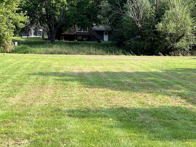 view of yard featuring a deck