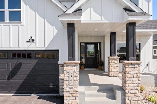 property entrance featuring a garage and covered porch