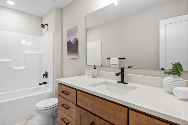 full bathroom with toilet, shower / bathing tub combination, and vanity