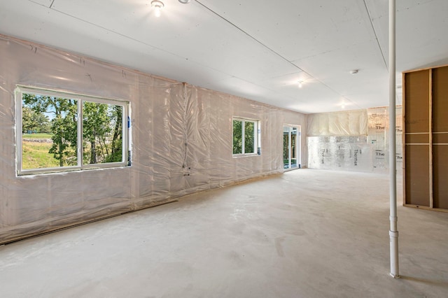 interior space with a wealth of natural light and concrete floors