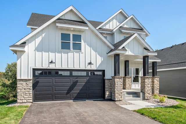 view of front of home with a garage