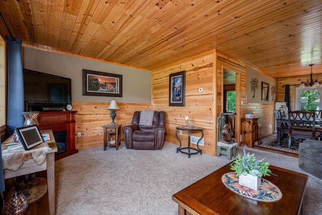 living room featuring carpet flooring, wooden ceiling, and a chandelier