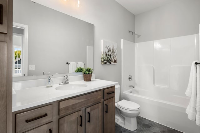 full bathroom featuring vanity, toilet, and shower / washtub combination