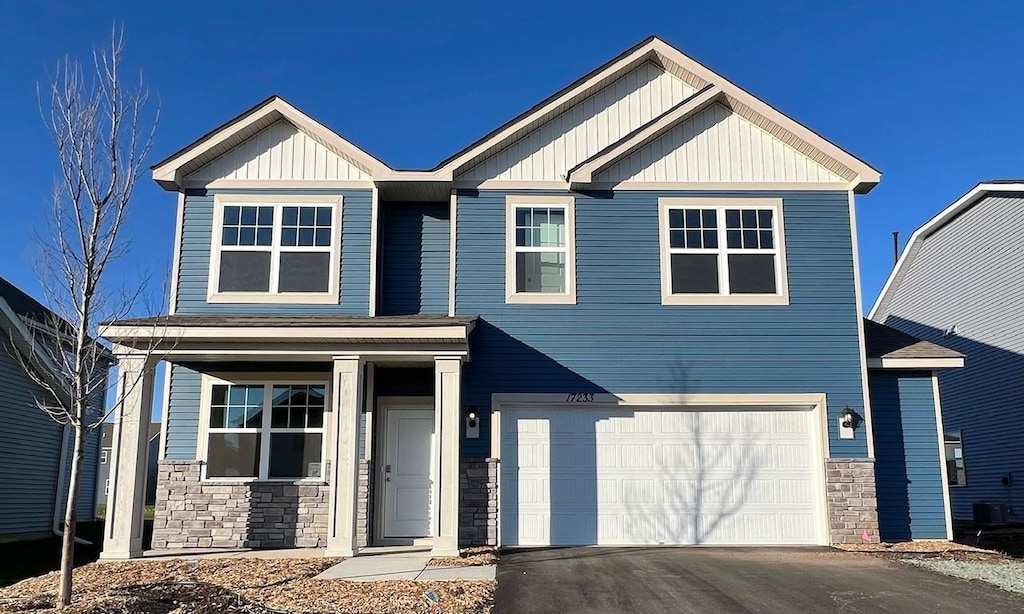 craftsman-style house featuring a garage