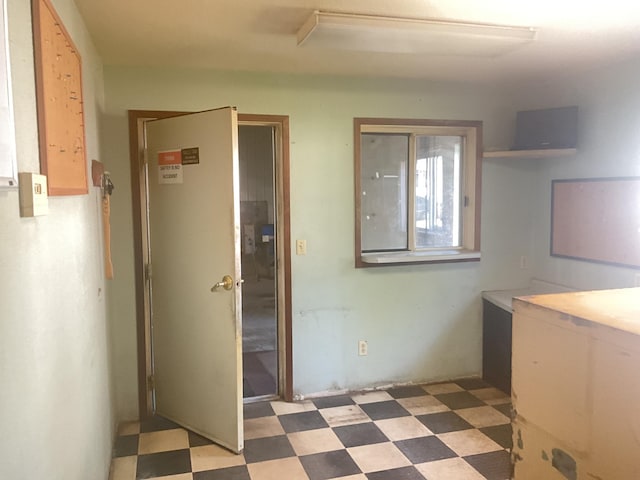 interior space featuring light tile patterned flooring