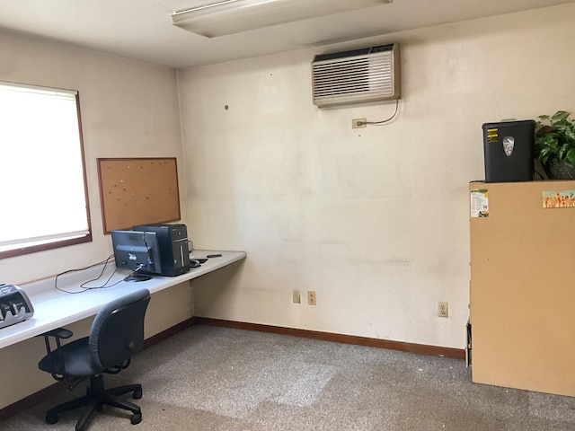 office area with a wall mounted air conditioner