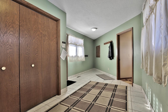 10834 178th Cir NW, Elk River, MN 55330 - entrance foyer featuring light tile patterned floors and a textured ceiling