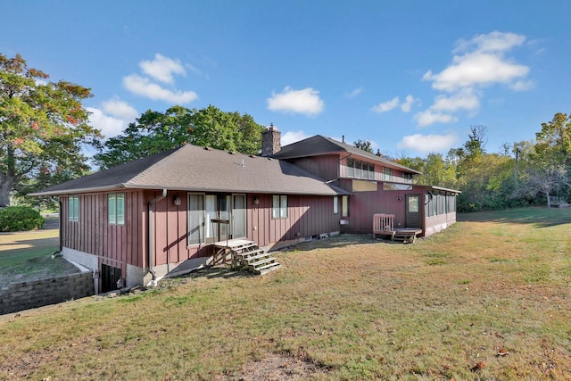 10834 178th Cir NW, Elk River, MN 55330 - back of house featuring a chimney, a lawn, and board and batten siding