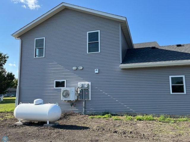 1204 Lincoln, Lisbon, ND 58054 - rear view of house with ac unit