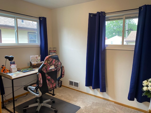 view of carpeted office space