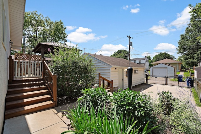 exterior space with an outdoor structure and a garage