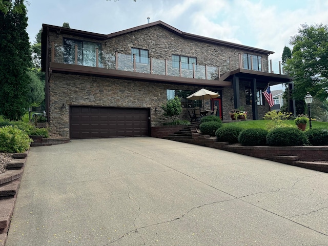 view of front of property with a garage