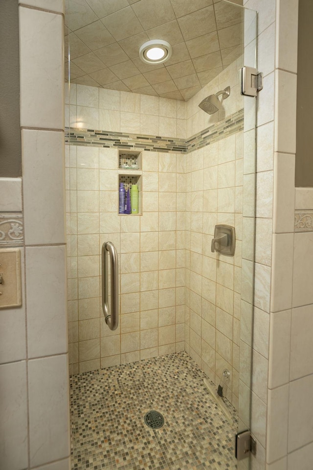 bathroom with an enclosed shower