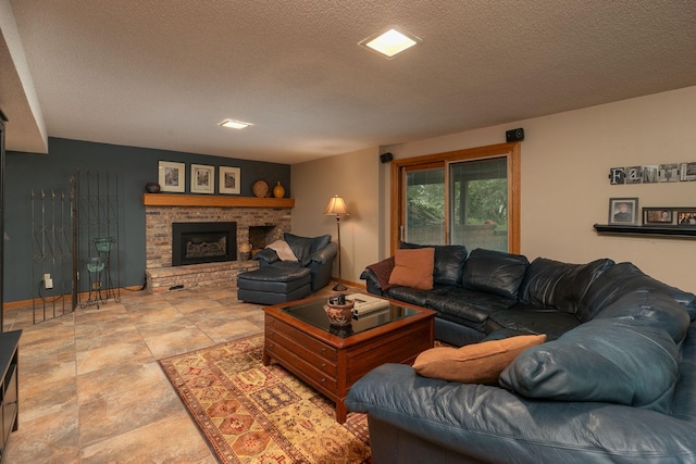 living room with a fireplace and a textured ceiling