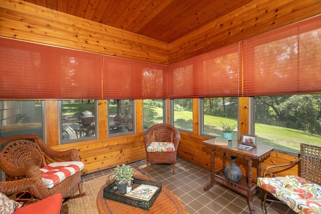 sunroom / solarium featuring wood ceiling