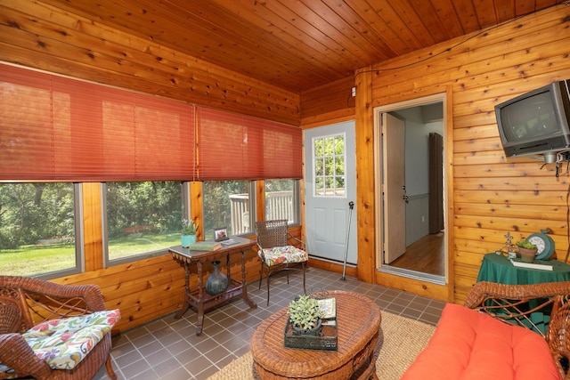 sunroom featuring wooden ceiling