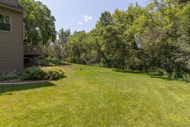 view of yard with a deck