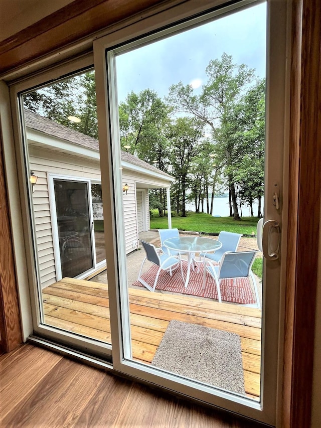 doorway to outside with hardwood / wood-style flooring