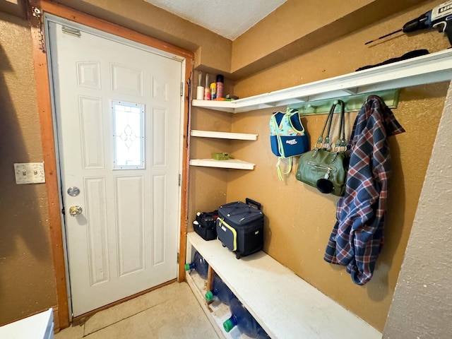 mudroom featuring light tile patterned floors