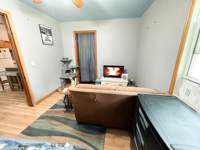 miscellaneous room featuring wood-type flooring and ceiling fan