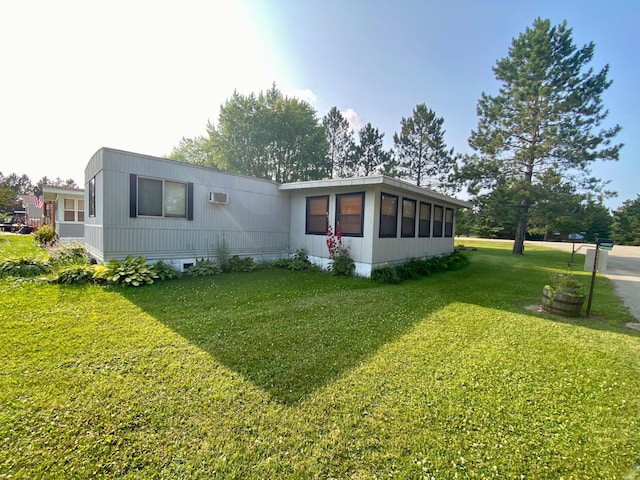 LOT178 28th, Baudette Twp, MN 56623 - back of property with crawl space and a yard