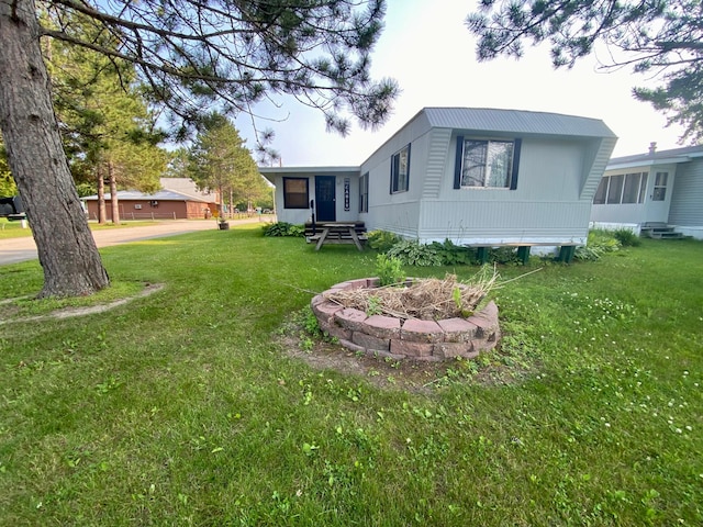 LOT178 28th, Baudette Twp, MN 56623 - exterior space with a sunroom and entry steps