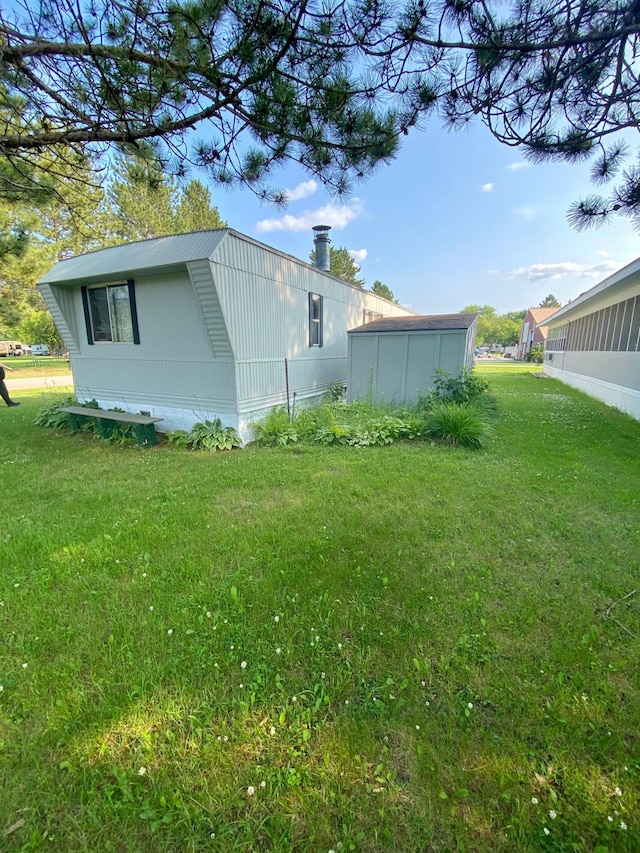 LOT178 28th, Baudette Twp, MN 56623 - view of side of property with a lawn