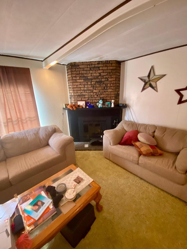 carpeted living room featuring a fireplace and brick wall