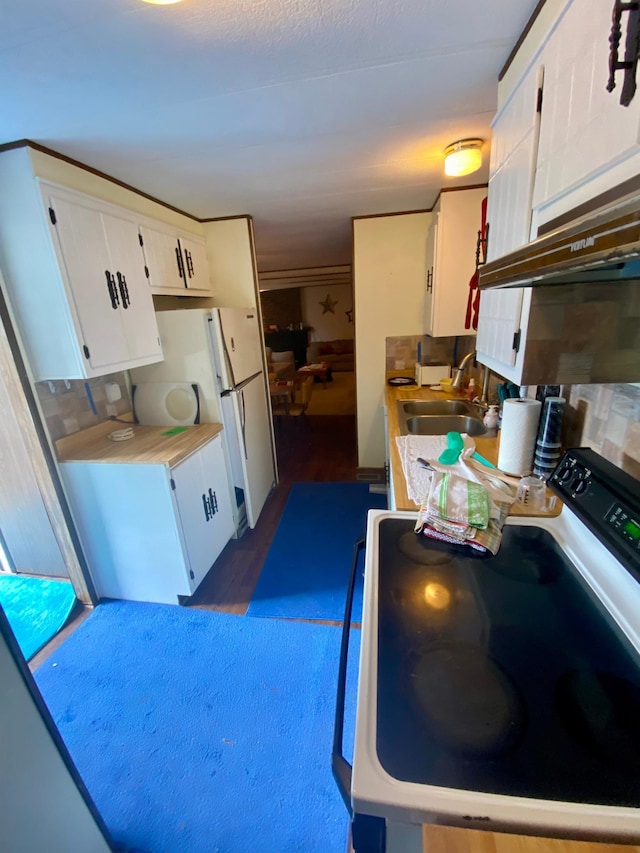 LOT178 28th, Baudette Twp, MN 56623 - kitchen with white cabinets, light countertops, a sink, electric range, and dark wood-style flooring