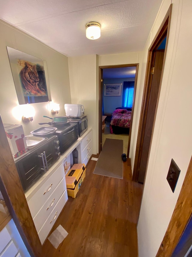 LOT178 28th, Baudette Twp, MN 56623 - hallway featuring dark wood finished floors
