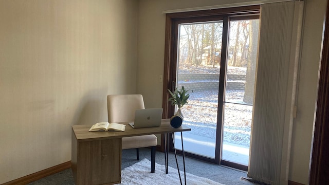 view of carpeted office space