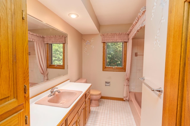 full bathroom with toilet, shower / bath combo, and vanity