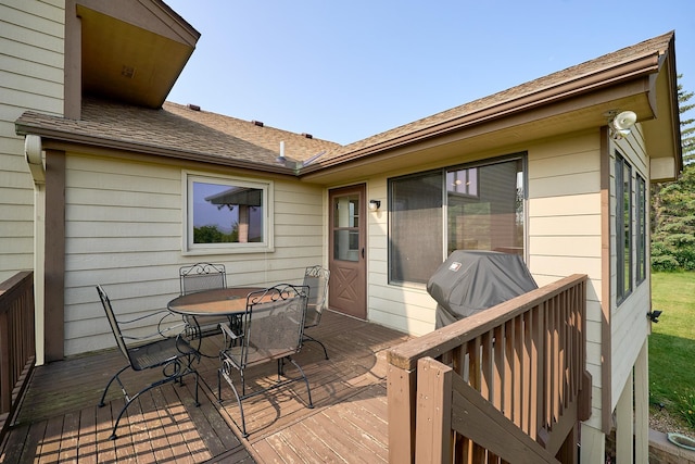 deck featuring outdoor dining area