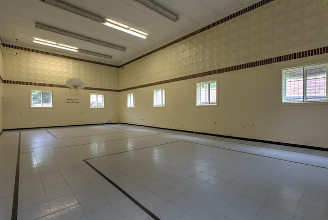 view of sport court with plenty of natural light