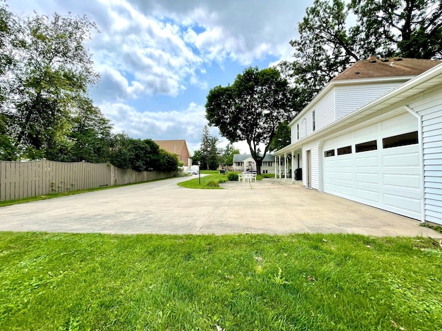 view of yard with a garage