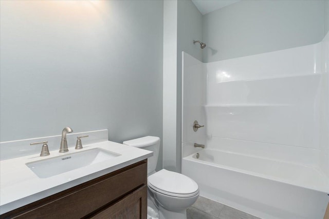 full bathroom with tile patterned floors, bathing tub / shower combination, vanity, and toilet