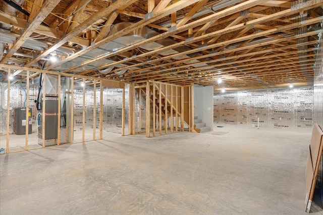 basement featuring electric water heater