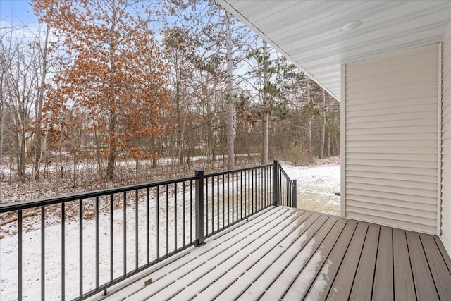 view of snow covered deck