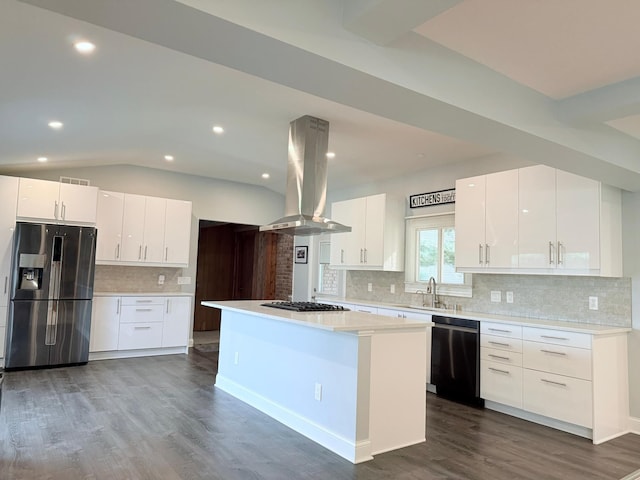 kitchen featuring island exhaust hood, white cabinetry, a center island, and stainless steel appliances