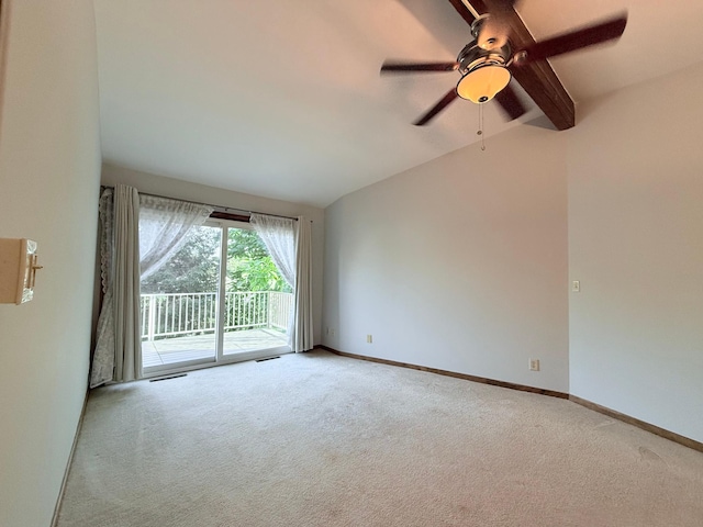 carpeted spare room with lofted ceiling with beams and ceiling fan