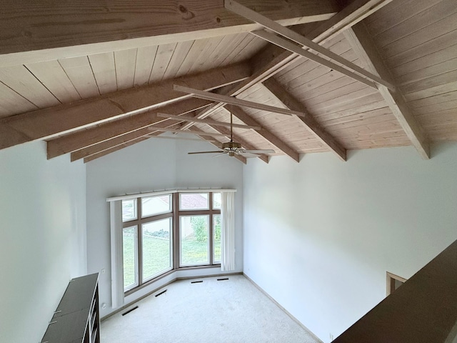 interior space featuring wood ceiling, lofted ceiling with beams, and carpet flooring