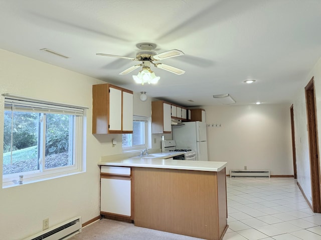 kitchen with a baseboard heating unit, white appliances, kitchen peninsula, and ceiling fan