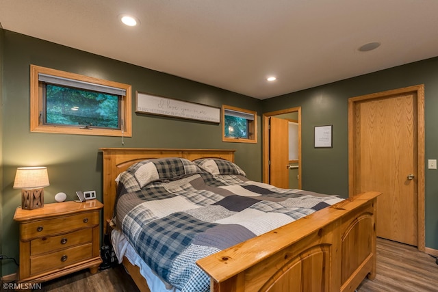 bedroom featuring dark hardwood / wood-style floors