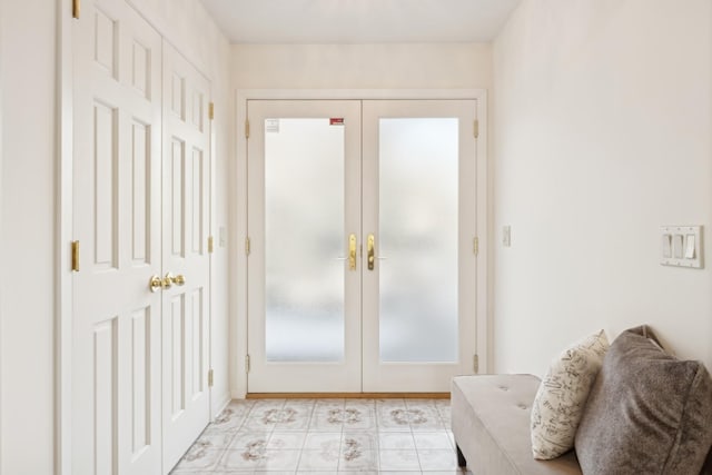 entryway featuring french doors