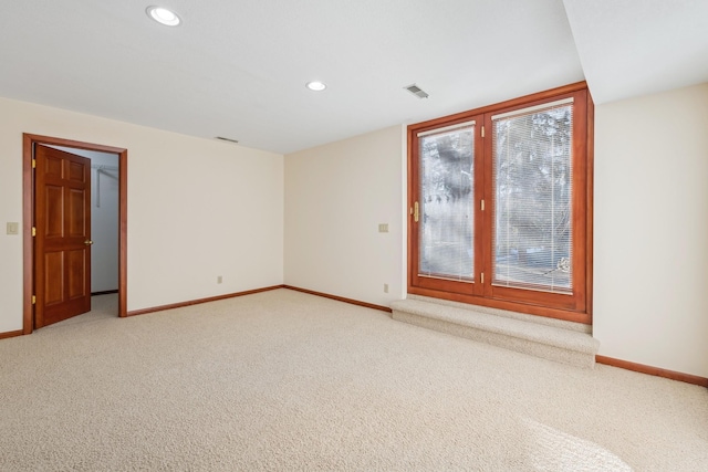 empty room featuring carpet flooring