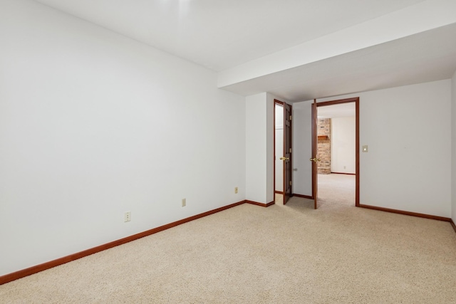 empty room featuring light colored carpet