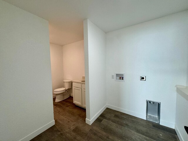 laundry area featuring baseboards, hookup for an electric dryer, washer hookup, and laundry area