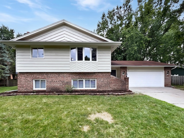 view of front facade with a garage and a front yard