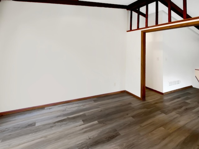 empty room with hardwood / wood-style flooring